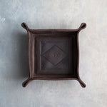 Dark Espresso leather valet tray with snapped corners and the initials MHC pressed into the diamond frame, seen from above