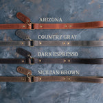 Personalized leather dog leash in four brown and gray tones with engraved tabs