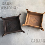 Two leather valet trays in Dark Espresso and Caramel
