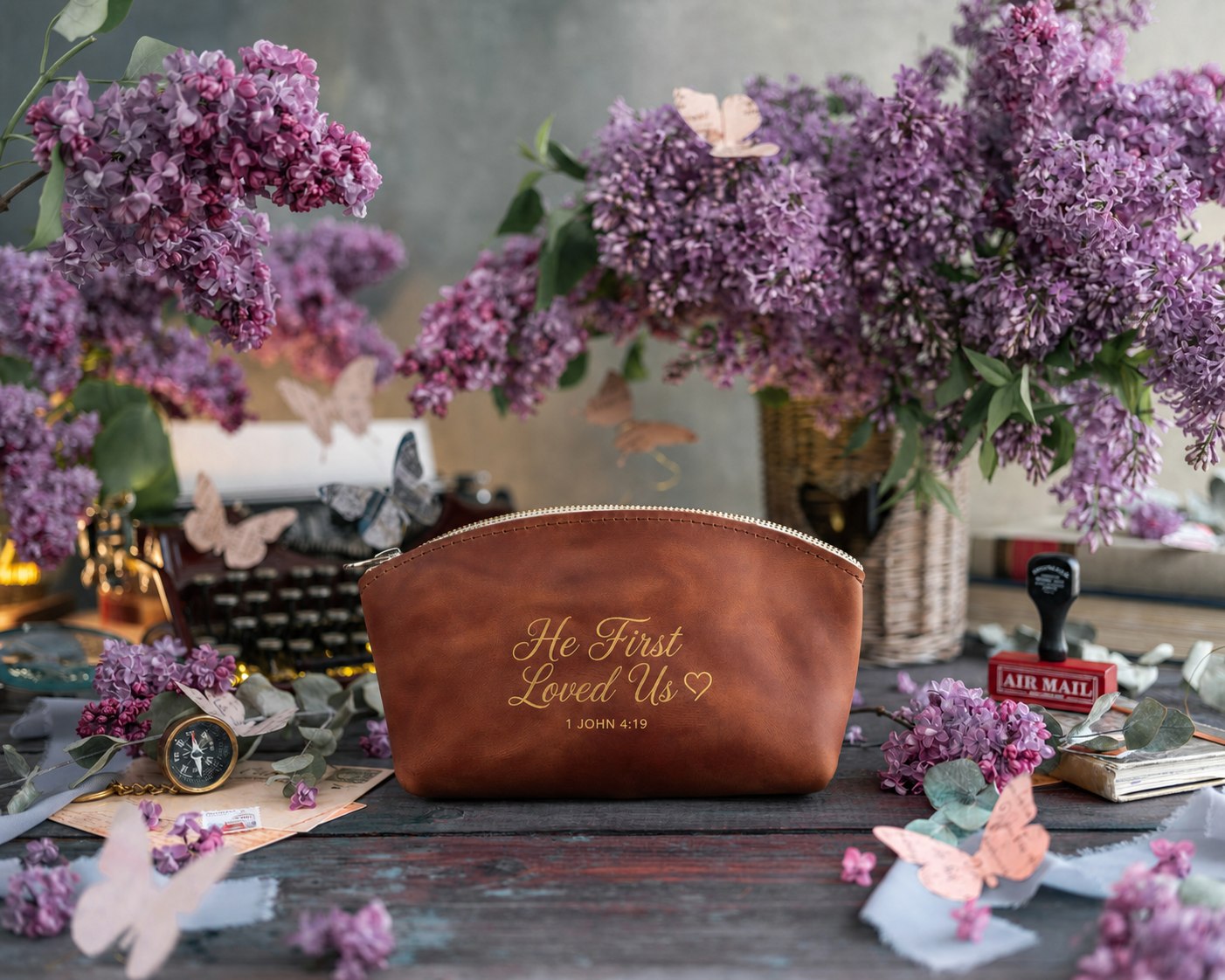 He First Loved Us 1 John 4:19 Arizona full-grain leather makeup bag, Christian scripture gift