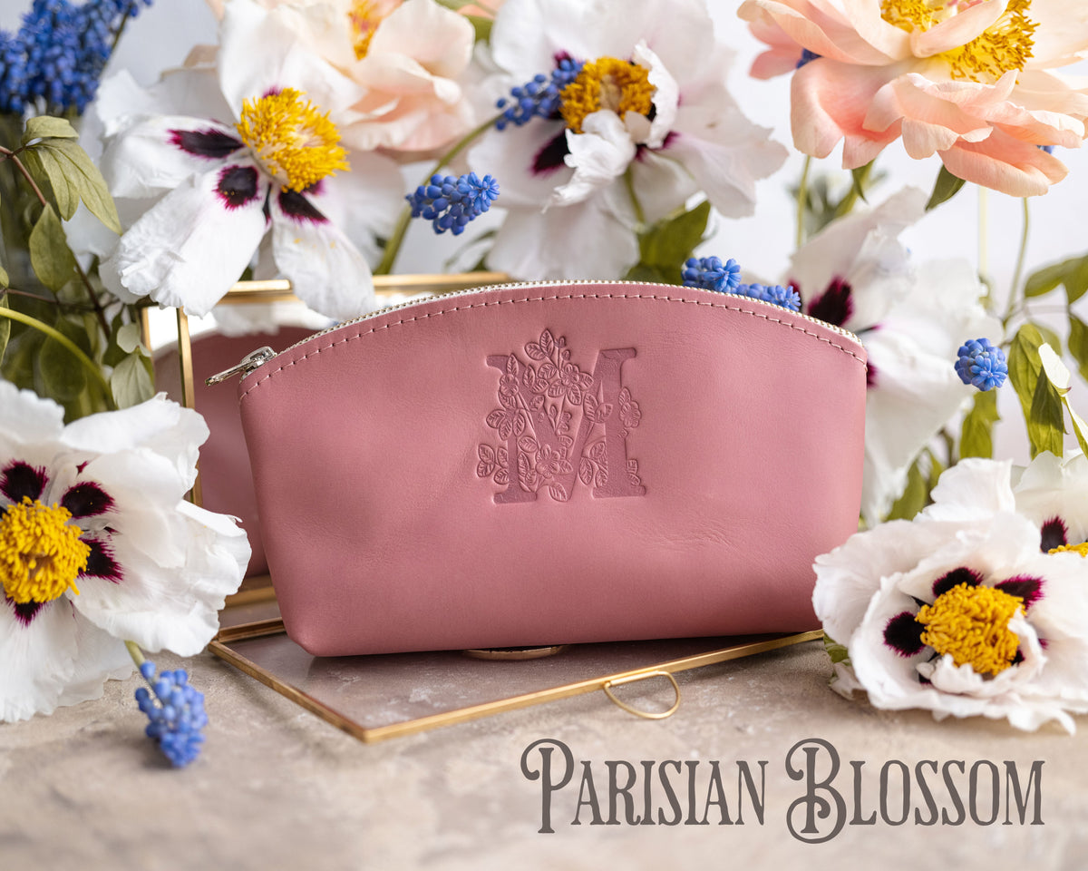 Parisian blossom rose leather makeup bag with a floral letter M, white anemones behind