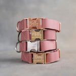 Dusty Pink dog collars in Parisian Blossom full-grain leather, 1 in wide, with quick release buckles engraved with names