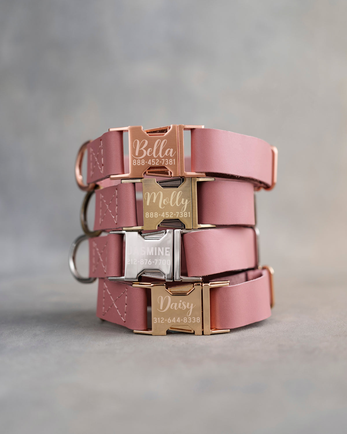 Dusty Pink dog collars in Parisian Blossom full-grain leather, 1 in wide, with quick release buckles engraved with names