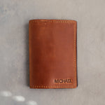 Arizona leather passport cover with the name MICHAEL in straight capitals pressed into the bottom corner