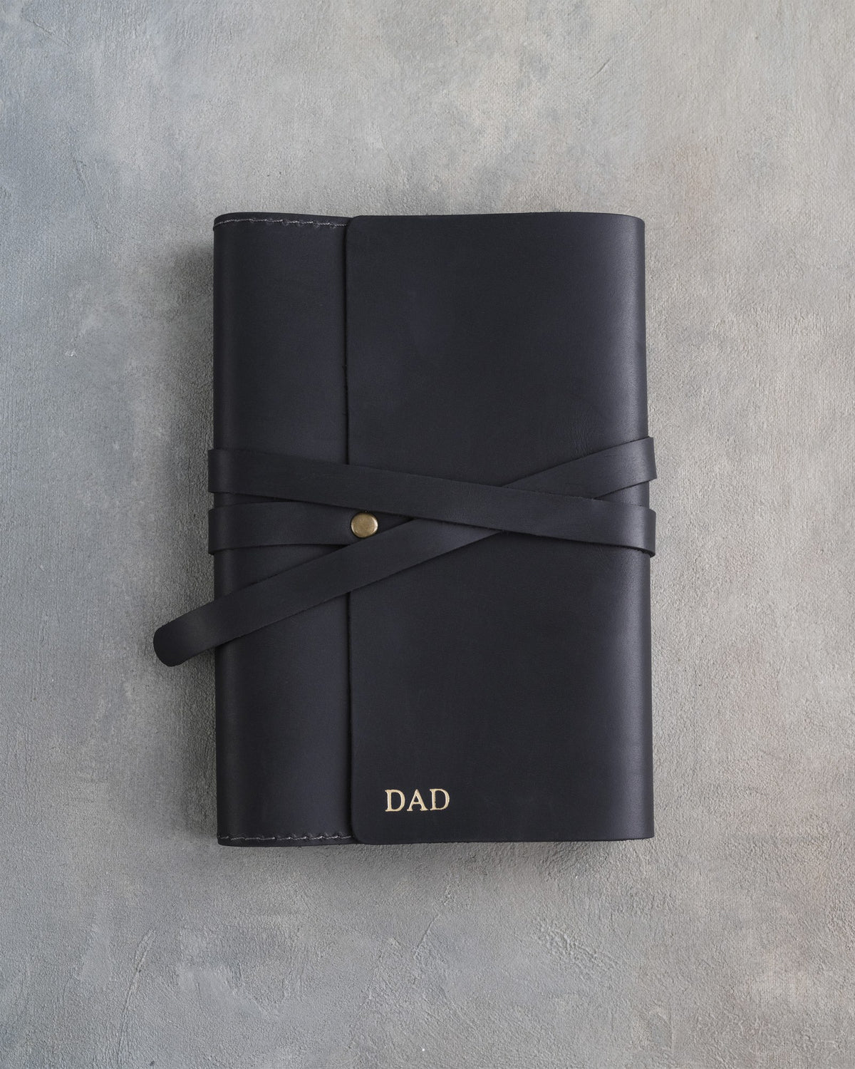 Black leather journal, Medium size, front with a debossed name
