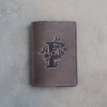 Country Gray leather passport cover with a large floral initial P pressed into the front