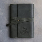 Forest Green leather journal with a logo blind debossed on the cover (sample logo: Leatherius Woodman)