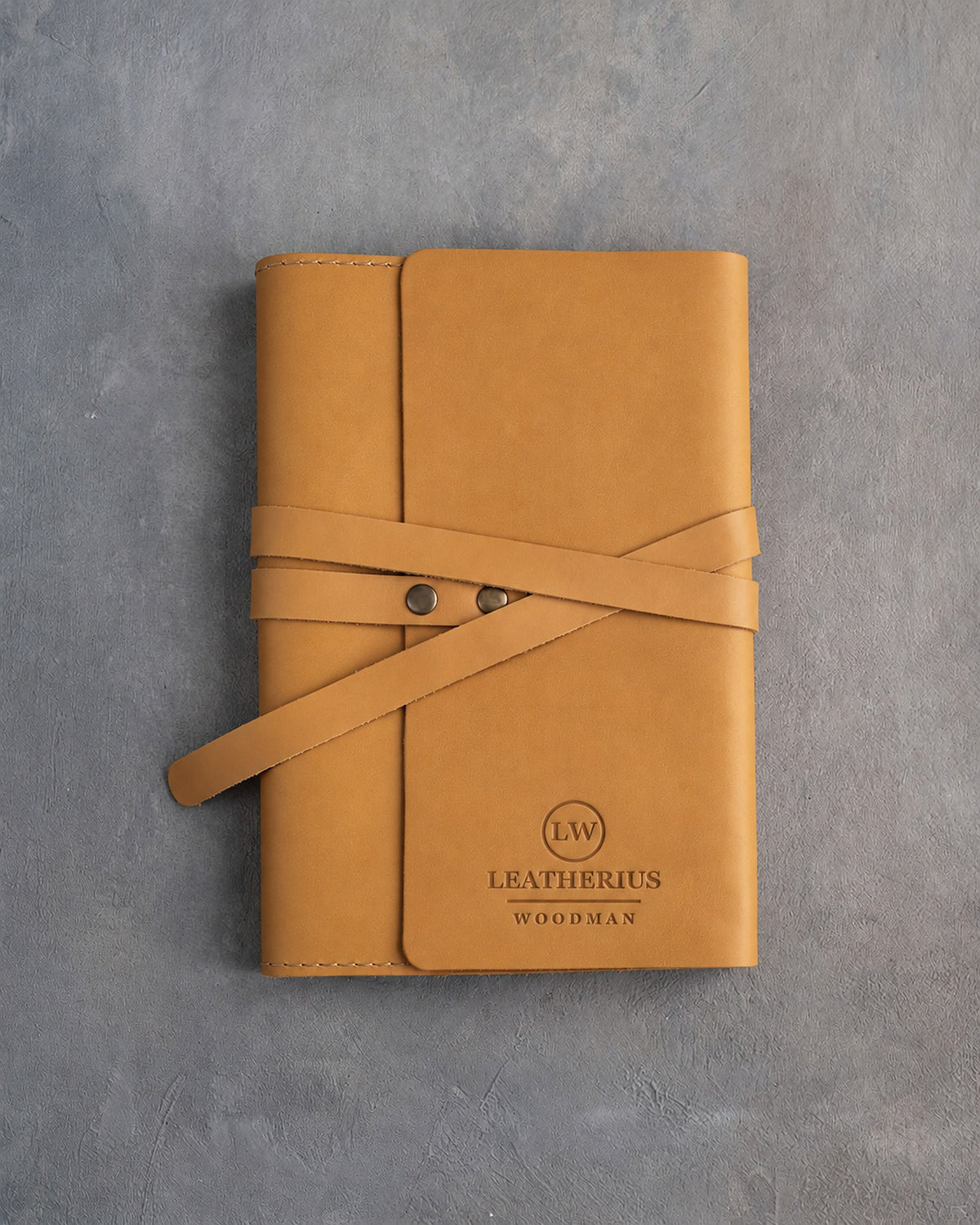 Indian Summer leather journal with a logo blind debossed on the cover (sample logo: Leatherius Woodman)