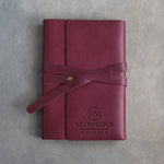 Sangria leather journal with a logo blind debossed on the cover (sample logo: Leatherius Woodman)