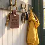 Brown Dad's keys PUT THEM BACK keychain on a truck key ring left on a kitchen counter