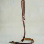 Matching Navy Bloom leash with leather trim and a brass clip