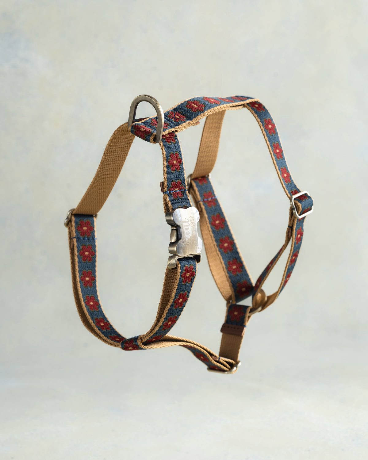 Navy Bloom webbing dog harness in the same pattern