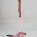 Matching Blush Daisy leash with leather trim and a brass clip
