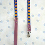 Marigold webbing dog leash with a leather handle