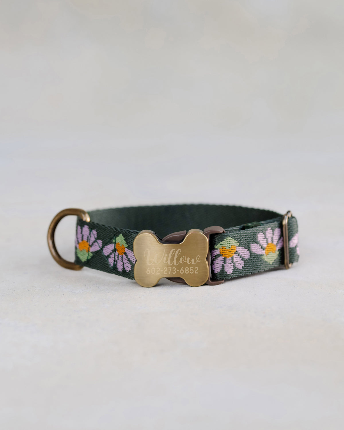 Lilac Daisy personalized webbing dog collar, design No. 1: lilac daisies on forest green, with an engraved bone buckle
