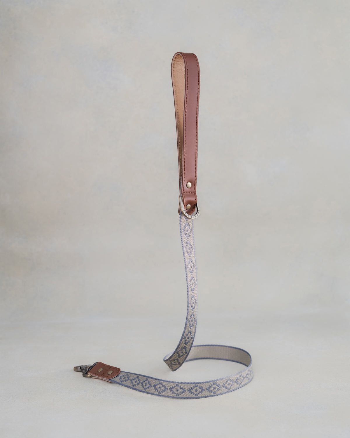 Matching Lavender Diamond leash with leather trim and a brass clip