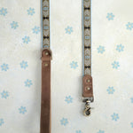 Arrowhead webbing dog leash with a leather handle