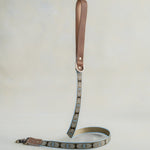 Matching Arrowhead leash with leather trim and a brass clip