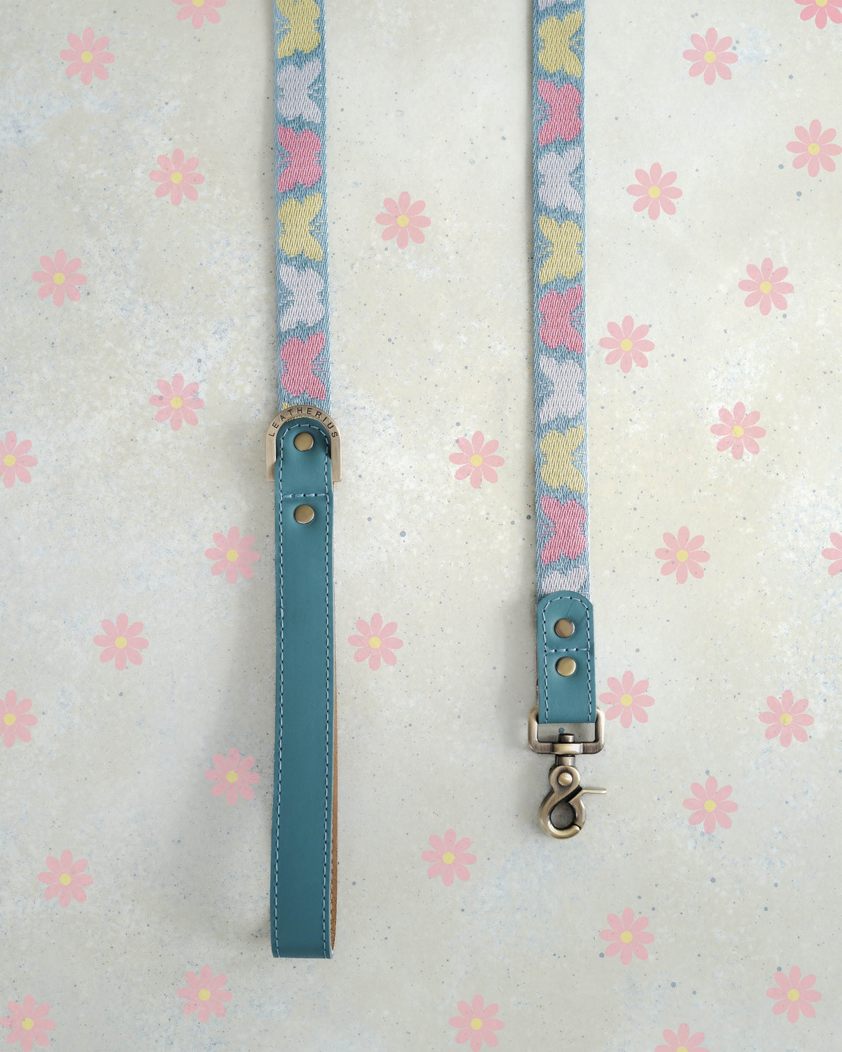 Butterflies webbing dog leash with a leather handle