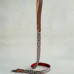 Matching Blue Tiles leash with leather trim and a brass clip