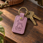 Lilac Dobie Mom leather keychain placed in a warm everyday setting