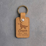 Indian Summer tan leather keychain debossed with a golden retriever and a small star above Cooper, 2012 · 2025 and THE GOLDEN, on gray concrete