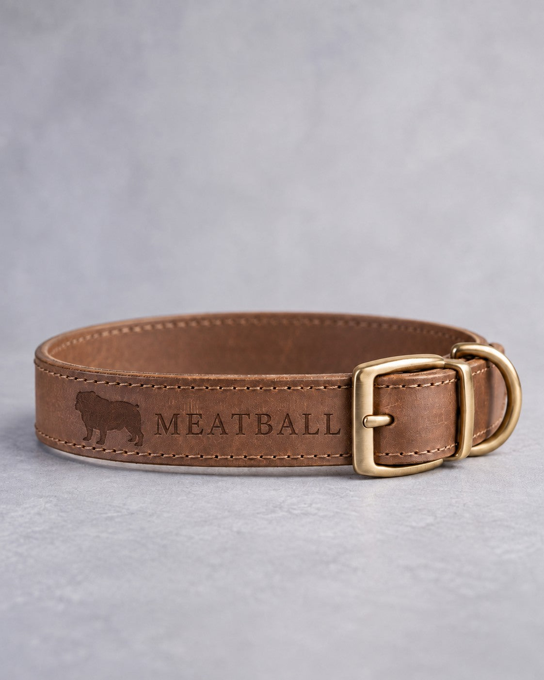 Sicilian Brown leather dog collar with an English bulldog silhouette and the name MEATBALL debossed, brass buckle