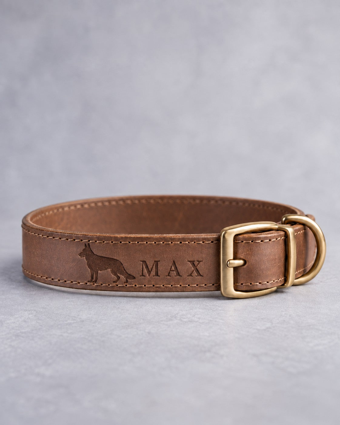 Sicilian Brown leather dog collar with a German shepherd silhouette and the name MAX debossed, brass pin buckle