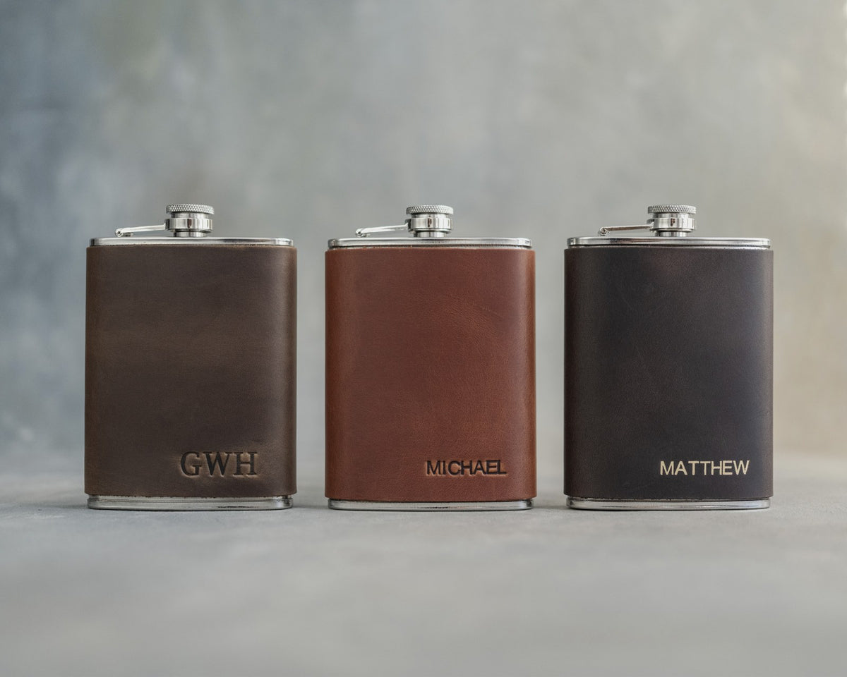 Three groomsmen flasks in Dark Espresso, Arizona and Black leather stamped GWH, MICHAEL and MATTHEW