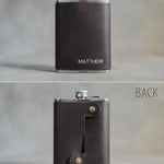 Front and back of a leather hip flask: the name stamped on the front, the snap strap closing the leather on the back