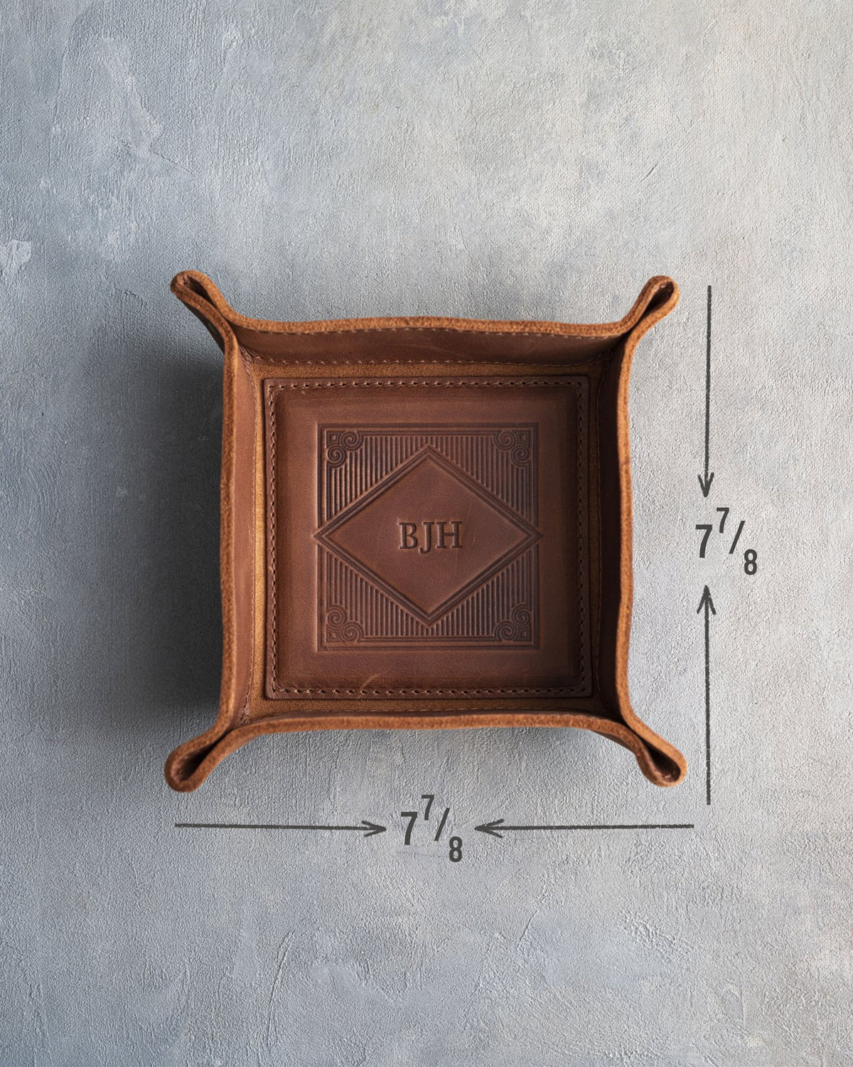 Arizona leather valet tray measured at 7 7/8 by 7 7/8 inches