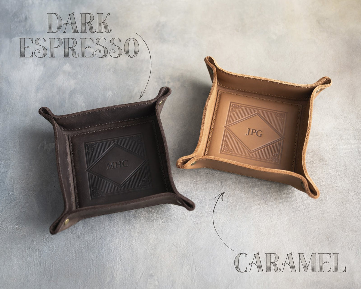 Two leather valet trays in Dark Espresso and Caramel