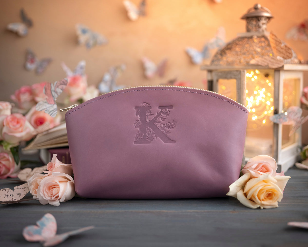 Lilac leather makeup bag with an engraved initial