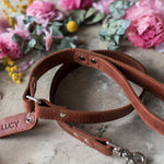 Leather dog leash in Arizona with a debossed name tab