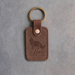 Sicilian brown leather keychain debossed with a standing Maine Coon cat above the name Leo and MAINE COON