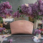 Makeup Bag In Blush Leather with hand-finished detailing