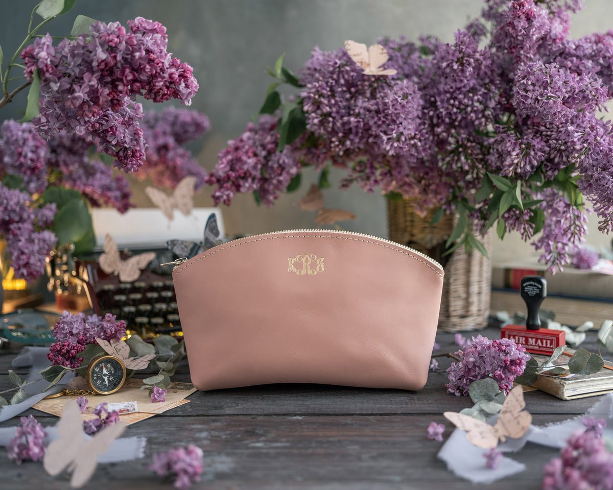 Makeup Bag In Blush Leather with hand-finished detailing