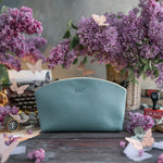 Makeup Bag In Turquoise Leather with hand-finished detailing