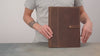 Video: opening the leather padfolio to show the tablet pocket, sheet protectors and notebook