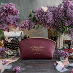 A Merry Heart Doeth Good Prov. 17:22 Sangria full-grain leather makeup bag, Christian scripture gift