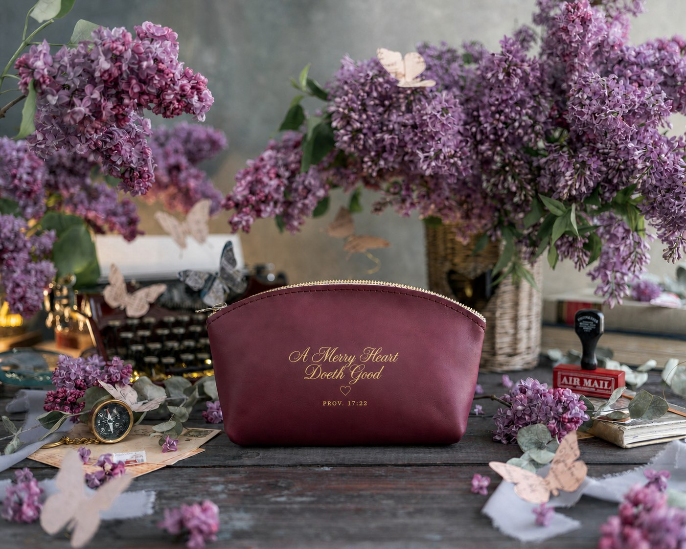 A Merry Heart Doeth Good Prov. 17:22 Sangria full-grain leather makeup bag, Christian scripture gift