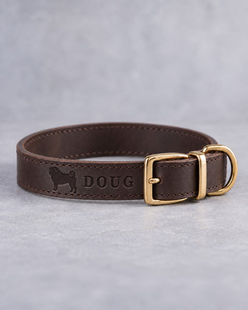 Dark Espresso leather dog collar with a pug silhouette and the name DOUG debossed, brass pin buckle