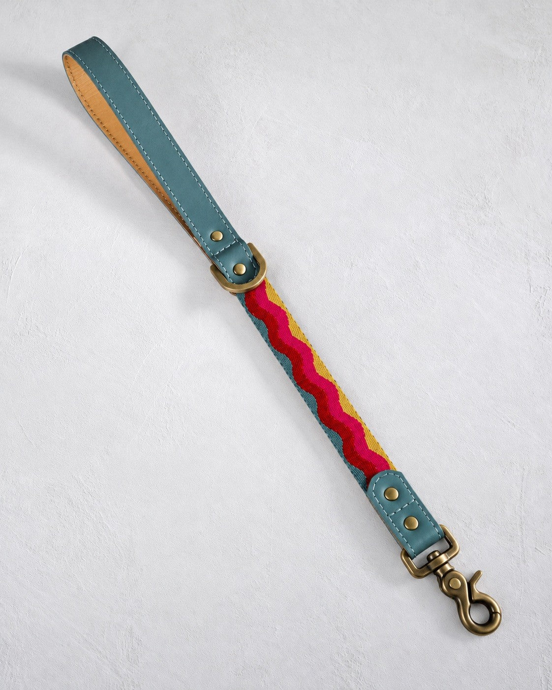 Short traffic dog leash in Summer Waves woven webbing with a sky blue leather handle