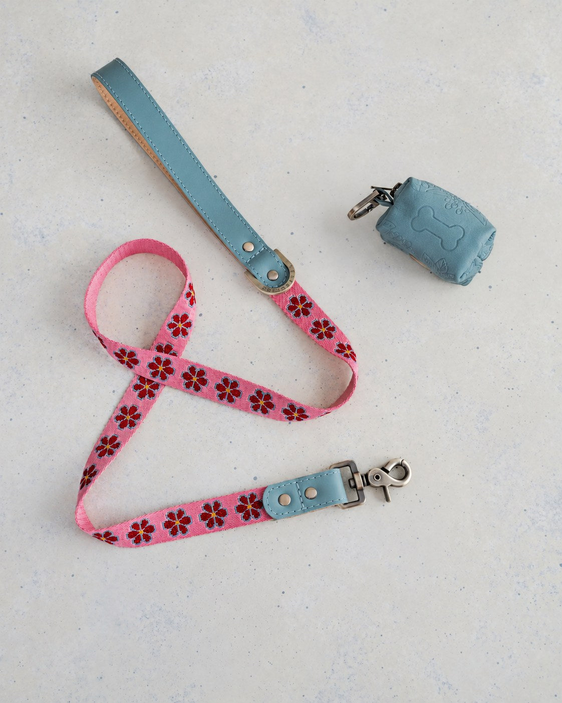 Rose Garden woven webbing dog leash with a matching leather poop-bag holder