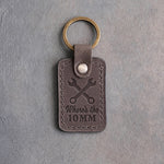 Country gray leather keychain debossed with crossed wrenches above Where's the and 10MM