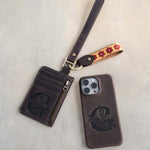 Webbing keychain on a leather card holder, the keychain that comes with the Simple Set