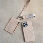 Webbing keychain on a leather card holder, the keychain that comes with the Simple Set