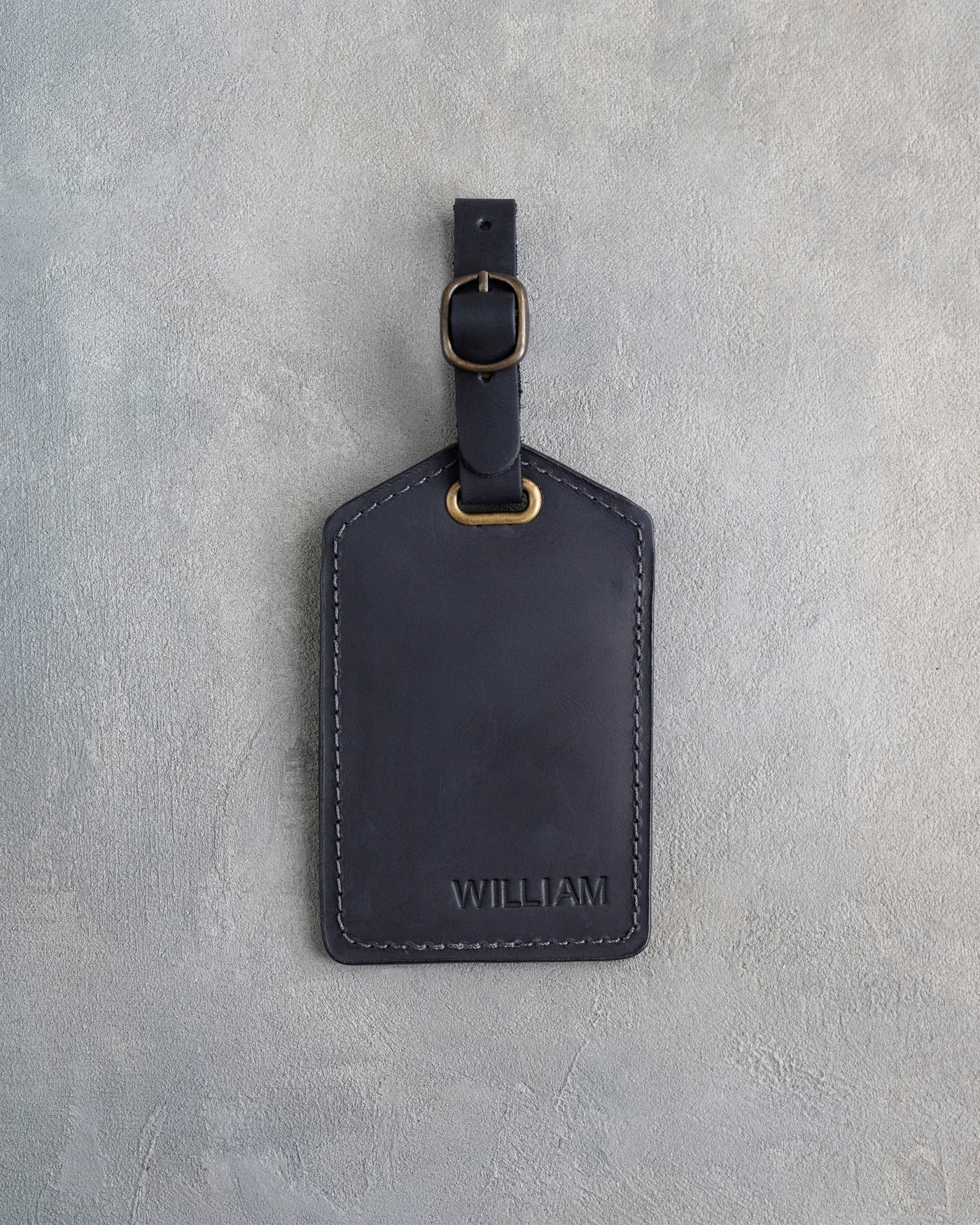 Minimalist Font Luggage Tag in Black Leather with hand-finished detailing