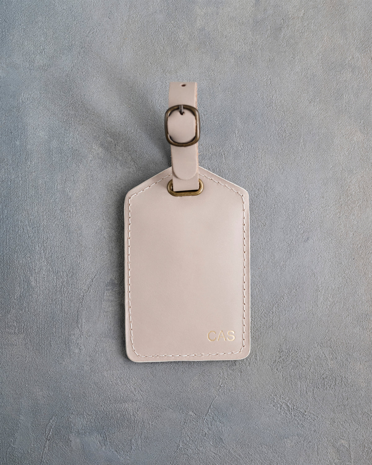 Minimalist Font Luggage Tag in Gray Sand Leather with hand-finished detailing
